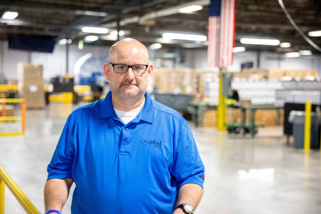 Ron Baron, general manager. He is wearing a blue Cabvi polo.